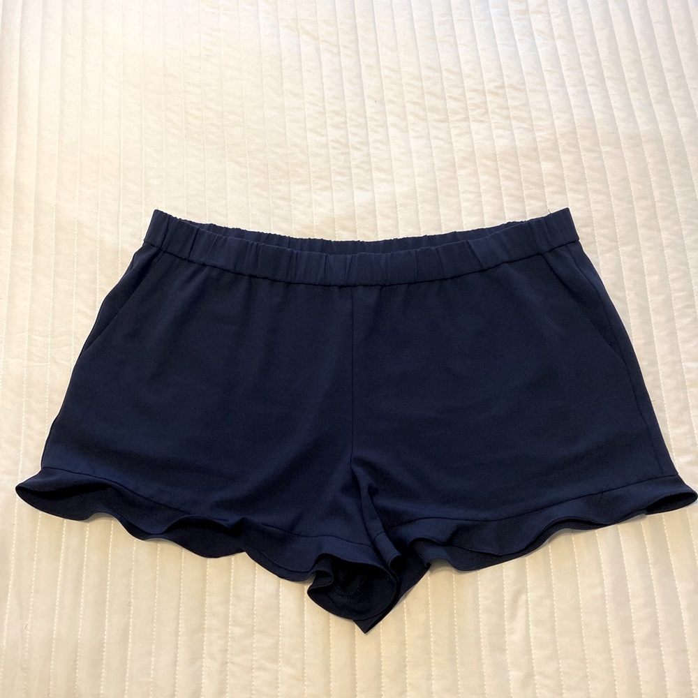 Navy ruffle bottom shorts